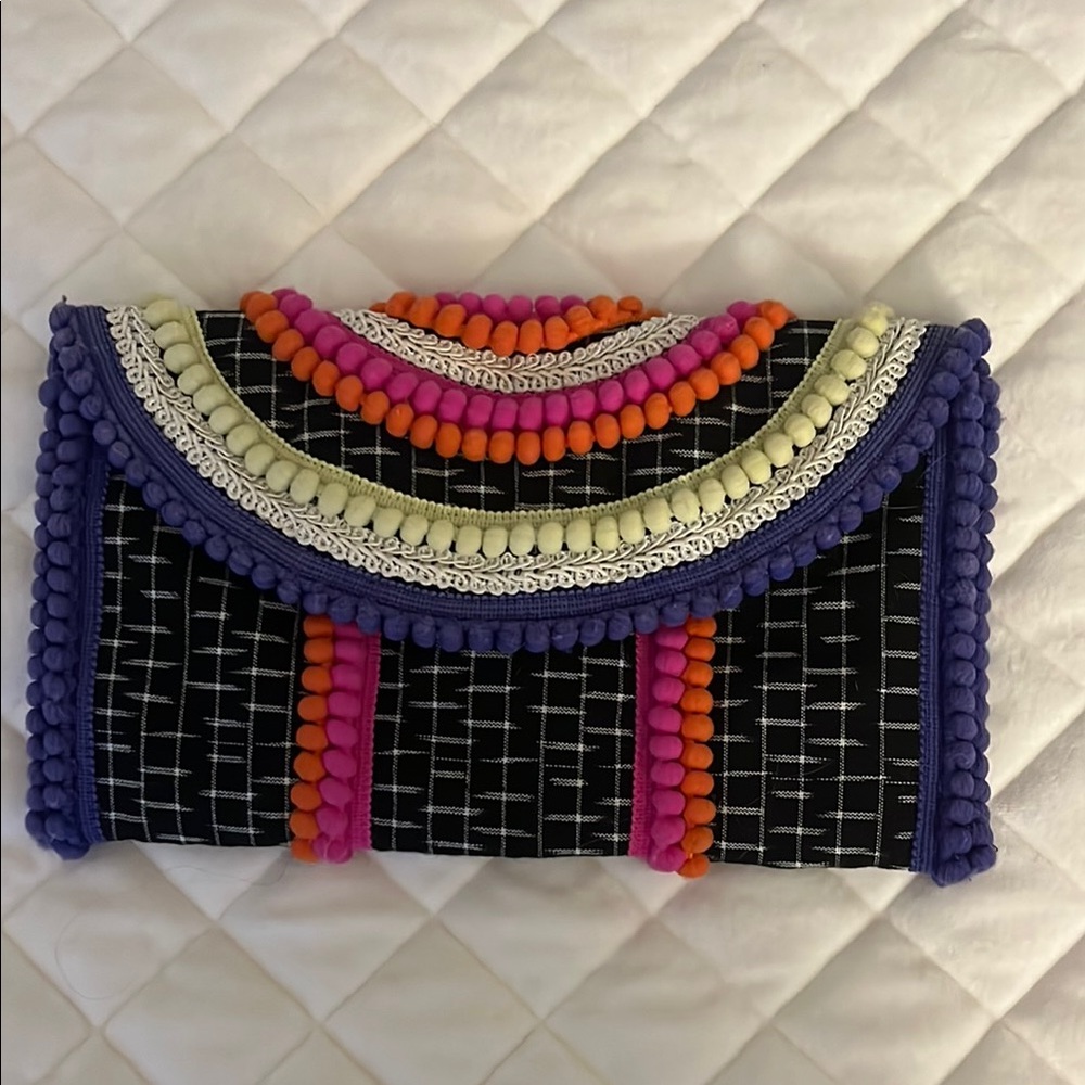 Black and Purple Woven Clutch with Textured Pattern and Vibrant Stripes